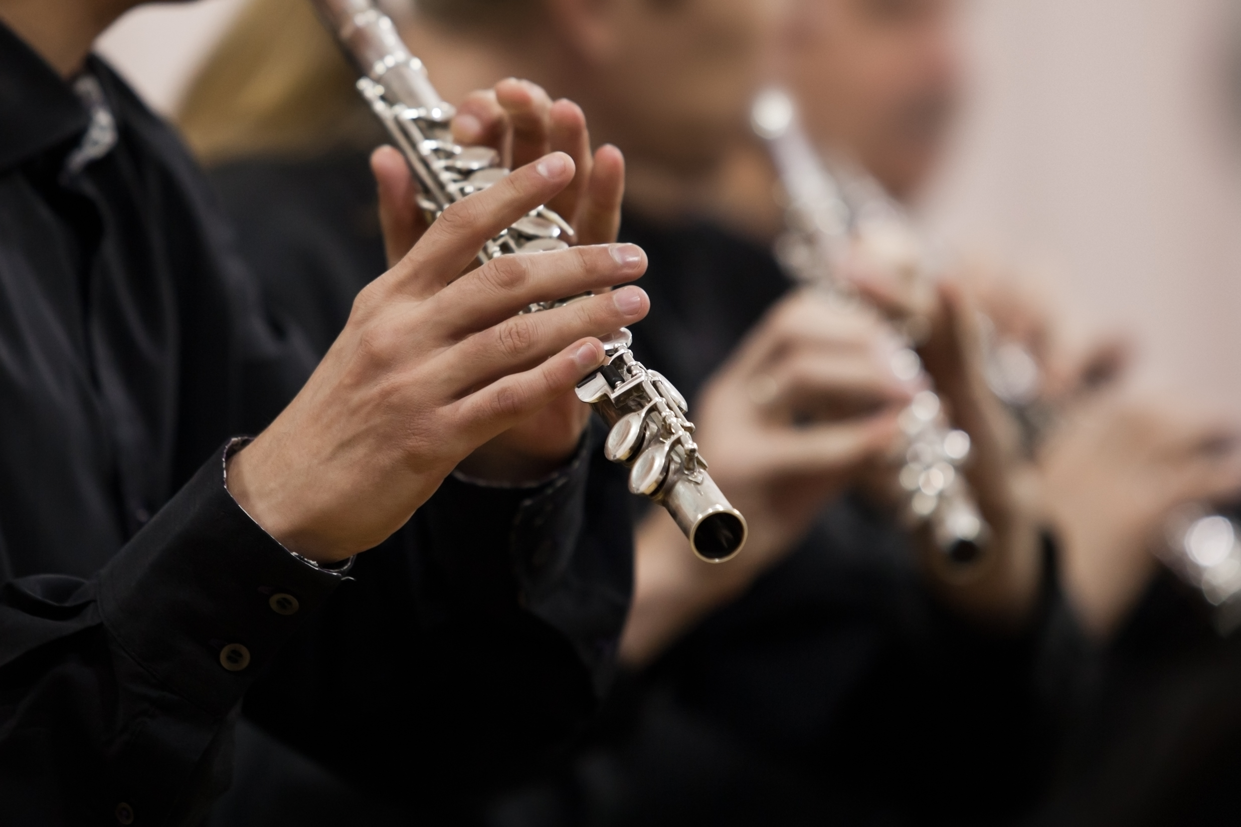 Hands,Musician,Playing,The,Flute,In,The,Orchestra,Closeup